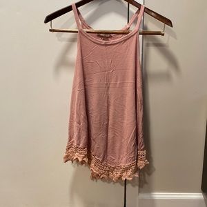 Large, pink rose, tank top with embroidery all the way around the bottom